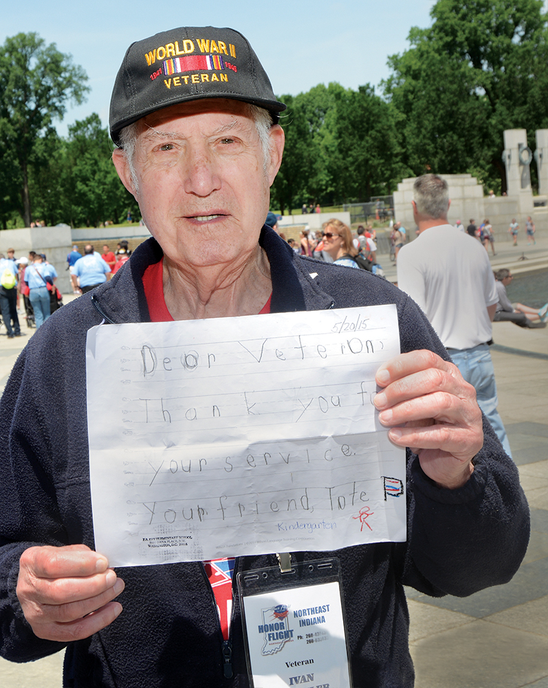 Amid the majestic stone and metalwork of the World War II Memorial, Fort Wayne veteran Ivan Detwiler seems most moved by a simple letter handed to him when the flight arrived at Reagan airport. The letter reads: "Dear Veteran, Thank you for your service. Your friend, Tate." Tate Butler is a kindergartner from Francis Scott Key Elementary in Washington.