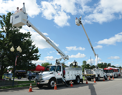 Kosciusko REMC had two bucket trucks offering rides into the sky Sept. 12 for visitors at the annual Family Safety Day in Warsaw. The REMC is a major sponsor of the event that attracted some 4,500 people this year. 