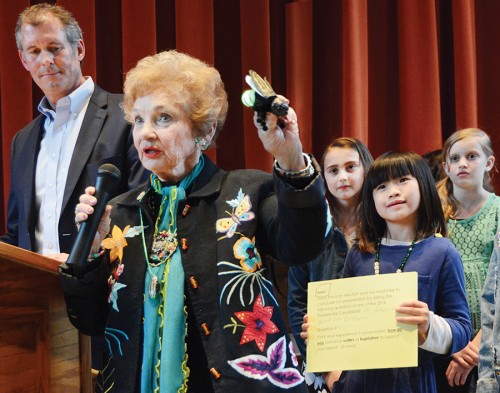 State Rep. Sheila Klinker holds up a firefly finger puppet before the West Lafayette city council last month while speaking in support of students from the city’s Cumberland Elementary. The council was considering a resolution endorsing the students’ efforts to have Say’s Firefly adopted as the Indiana state insect and also making the firefly the official insect of West Lafayette. Klinker, whose District 27 includes Lafayette and portions of West Lafayette, cosponsored the students’ bill in the Indiana General Assembly in January. It failed to pass out of the natural resources committee. Undeterred, the students and their firefly supporters in the Statehouse are mounting another attempt for the 2017 General Assembly — and are hoping to gain statewide support from schools, city governments and other organizations and individuals. Looking on, from right, are Cumberland third graders Vivi Agnew, Kayla Xu and Emma Williams, and West Lafayette Mayor John R. Dennis. The council unanimously passed the resolution.