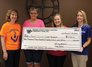 Several additional local organizations received Operation Round Up grants in the second quarter, too. Pictured from left are Mary Beth Gibbons with Prevent Child Abuse, Brenda McCain with Lawrence County Cancer Patient Services, Hannah Sage, REMC part-time employee, and Christi Morgan with Orange County Habitat for Humanity.
