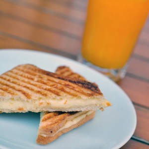 Orange juice and cheese sandwiches