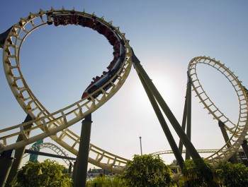 roller coaster zooming on tracks