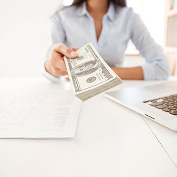 Lady handing someone money