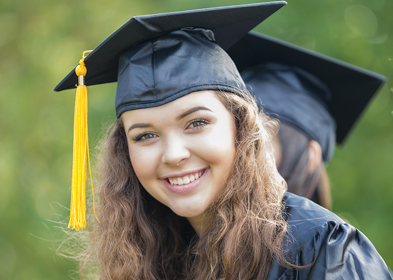 Young lady in cap and gown