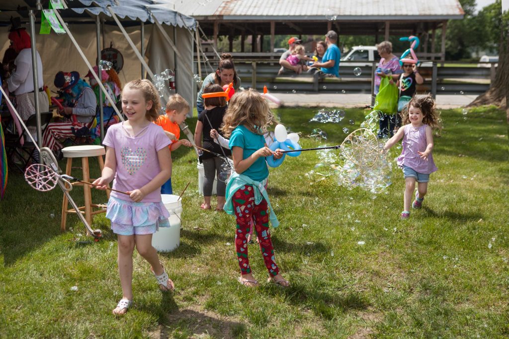 Kids blowing bubbles