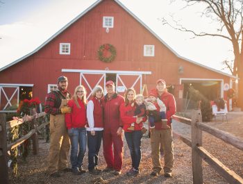 Dull Family in front of a barn
