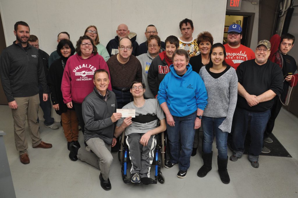 Photo of Noble REMC staff and The Arc Noble County Foundations members