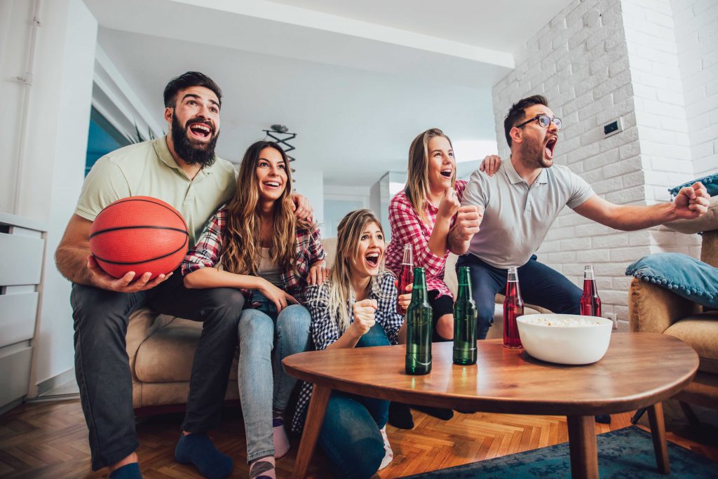 Photo of people watching a basketball game.