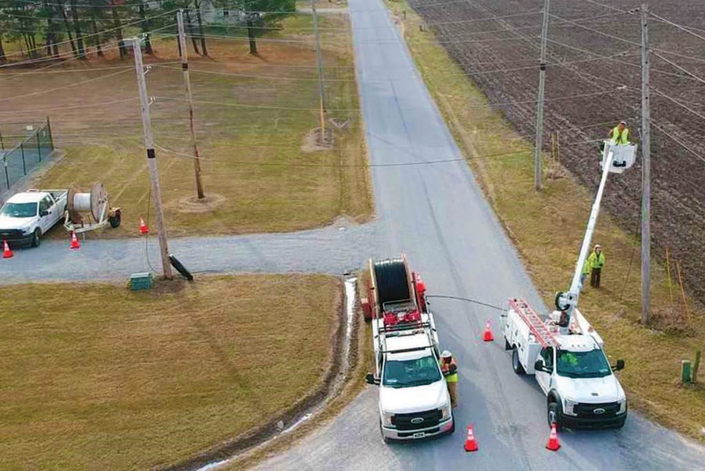 Photo of Heartland REMC line trucks