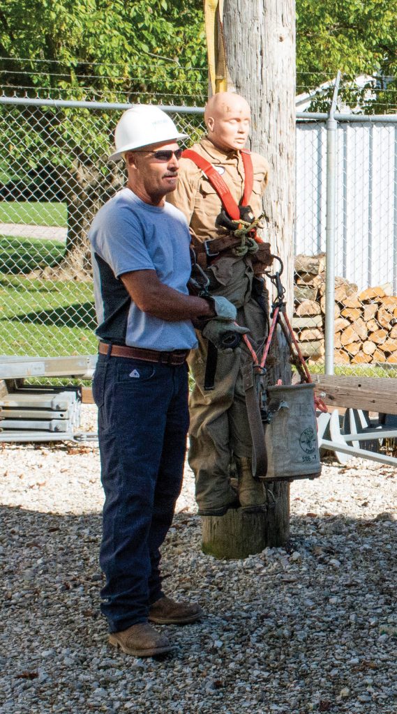 Photo of lineman Dave Helton teaching a training class.