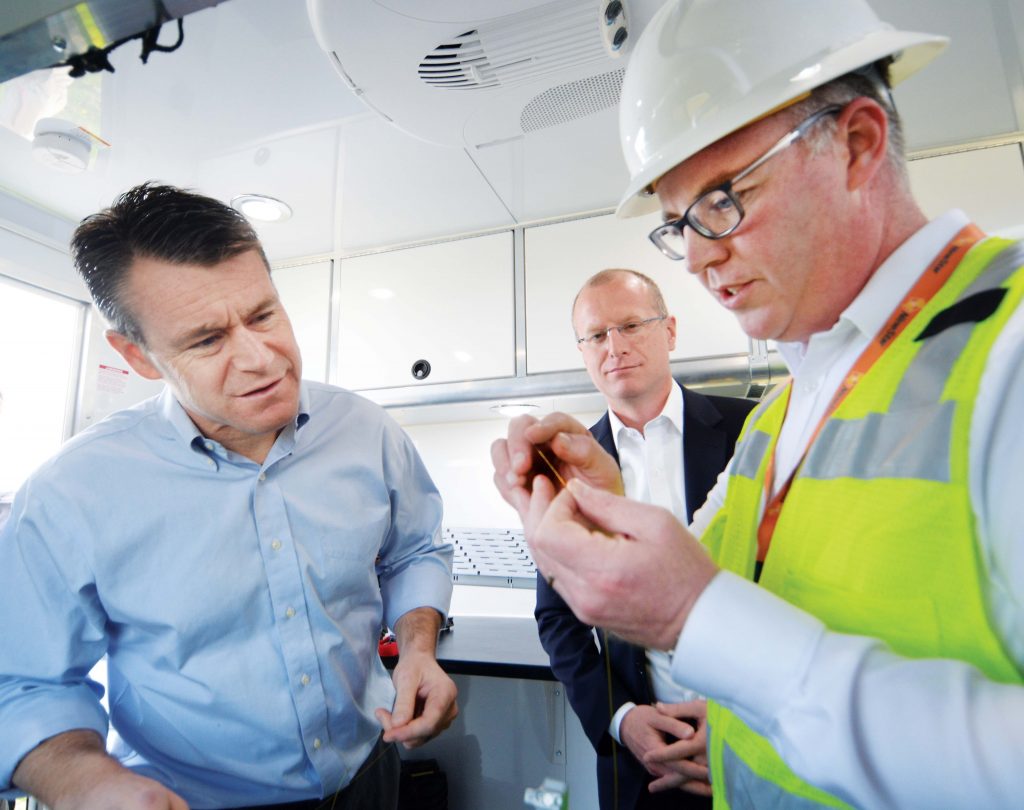 Photo of Sen. Todd Young with others during a visit to NineStar Connect.