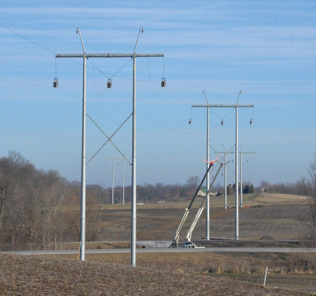 Photo of crews working on transmission towers
