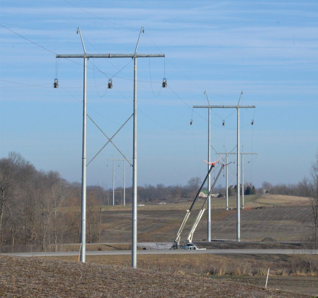 Photo of crews working on transmission towers