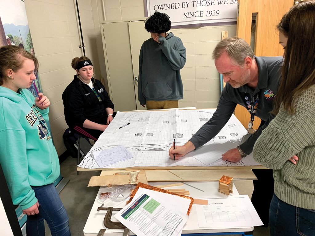 Charlestown High School students work on project