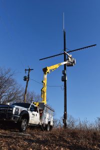 Photo of linemen at Cross on the Knobs