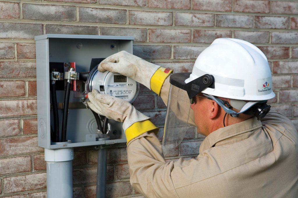 Photo of lineworker working on a meter