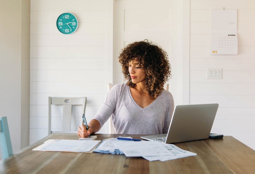 Woman paying bills