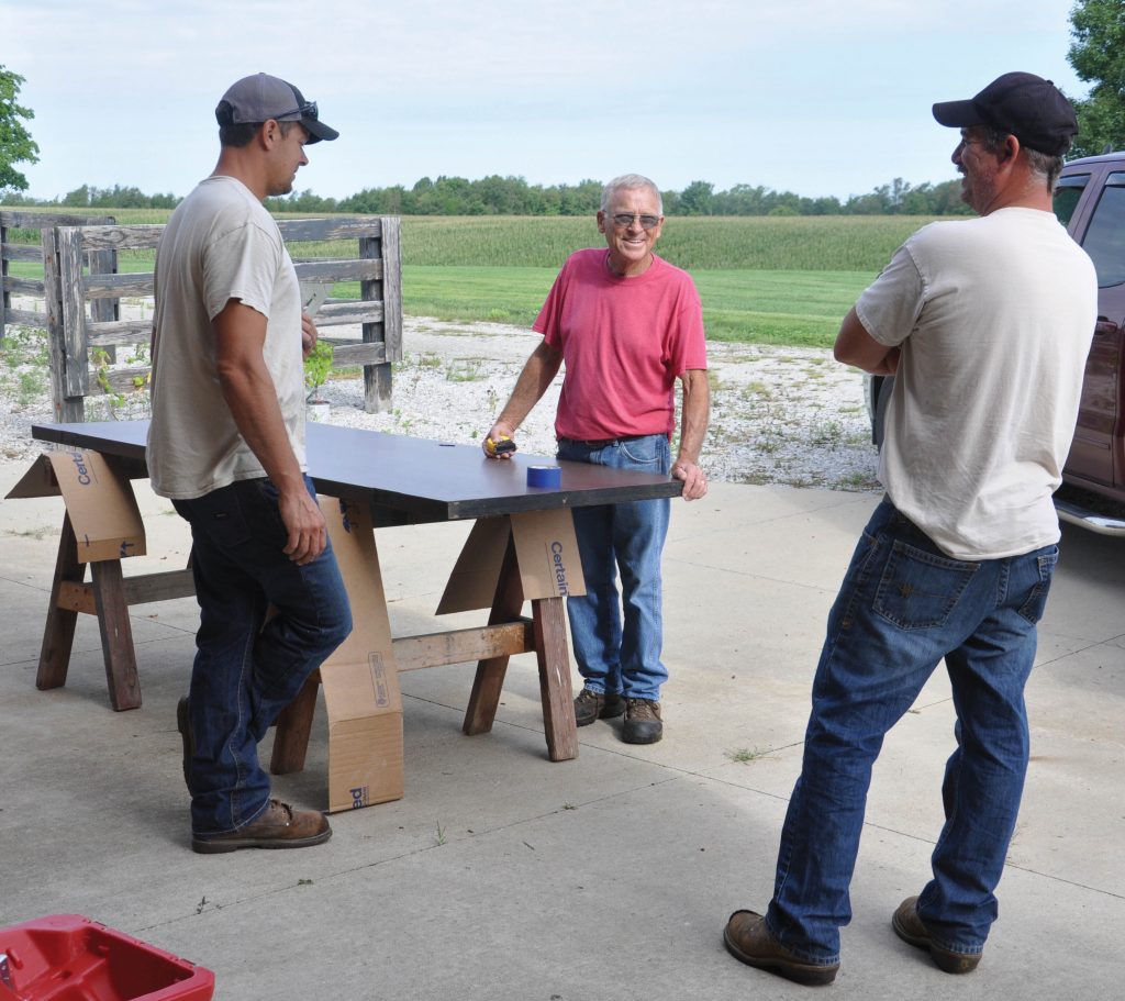 Photo of Bill Emmert and Noble employees