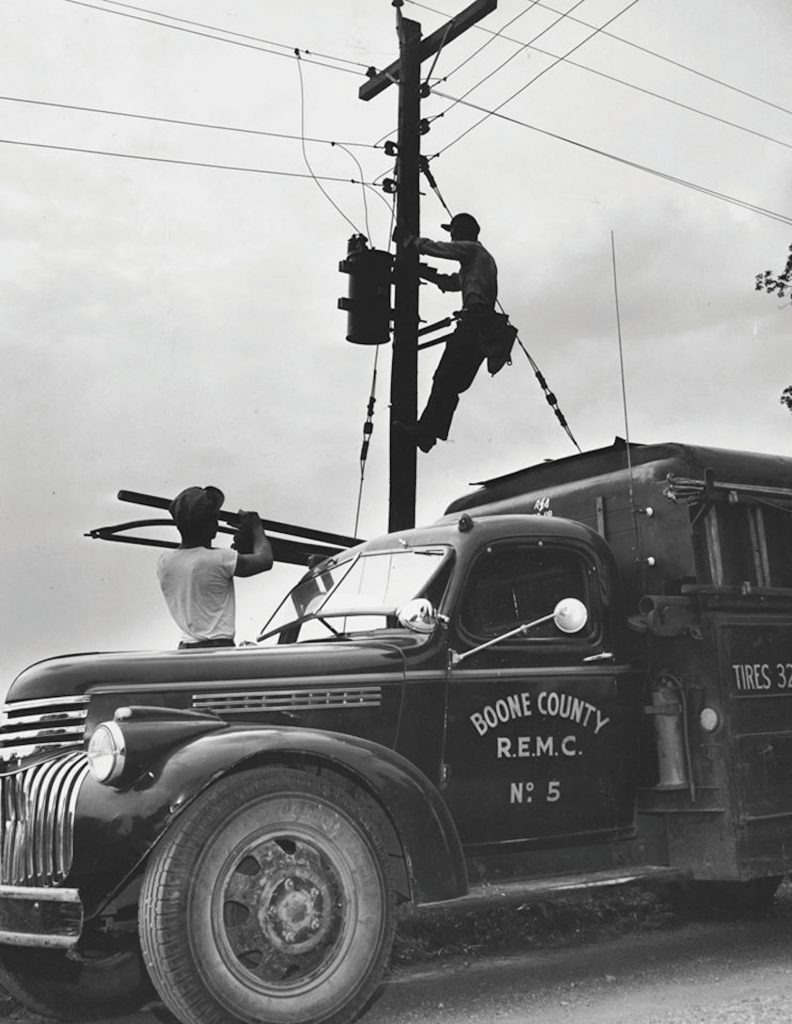 Photo of lineman at Boone REMC in early days
