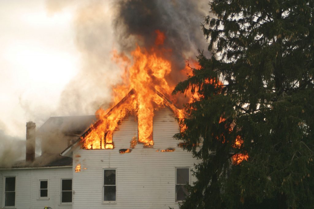 Photo of house on fire