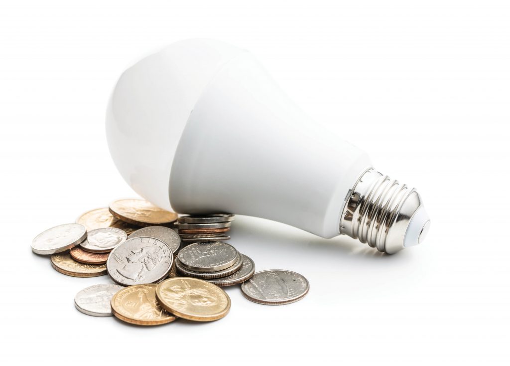 LED lightbulb with money around it