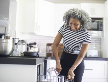 Lady at dishwasher