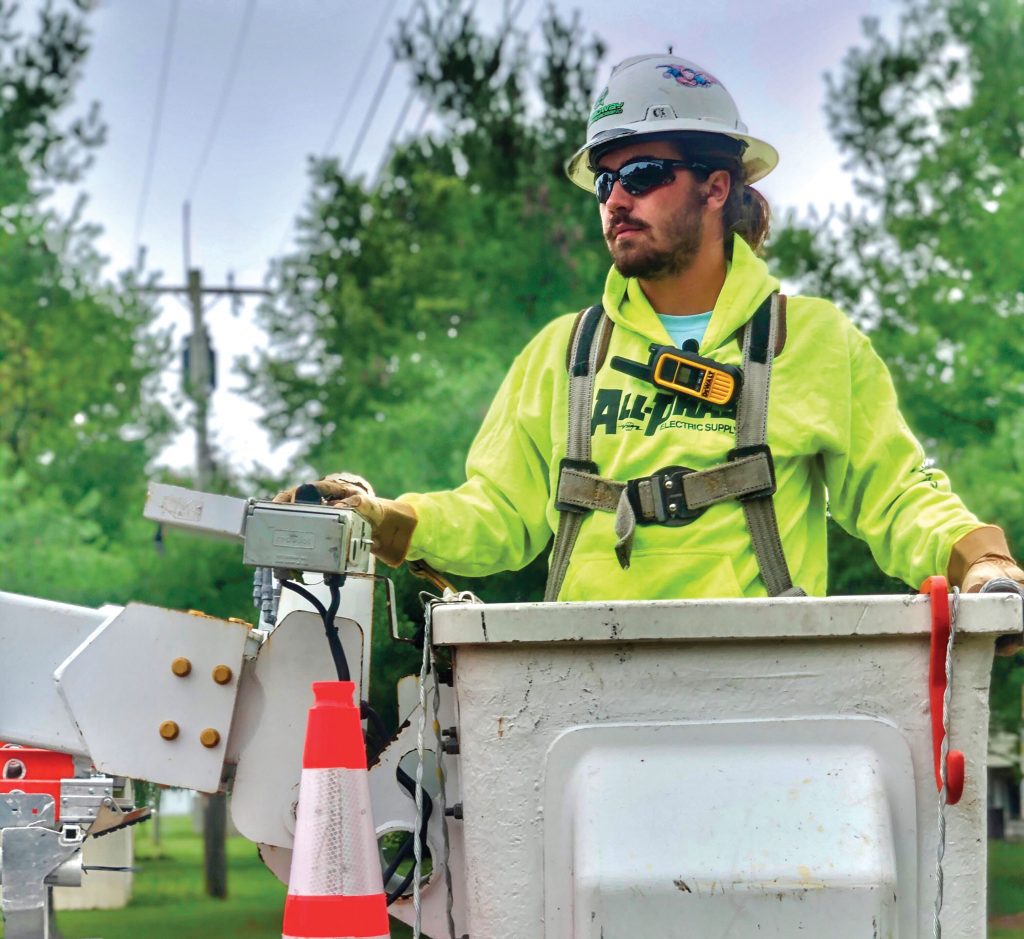 Worker in bucket truck