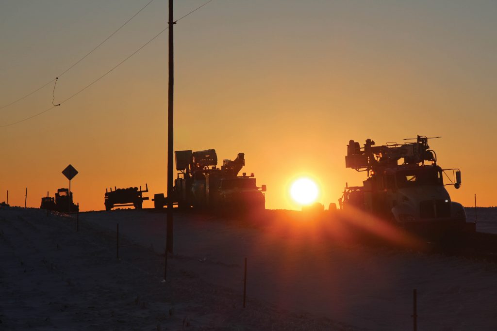 Sunset photo of lineman