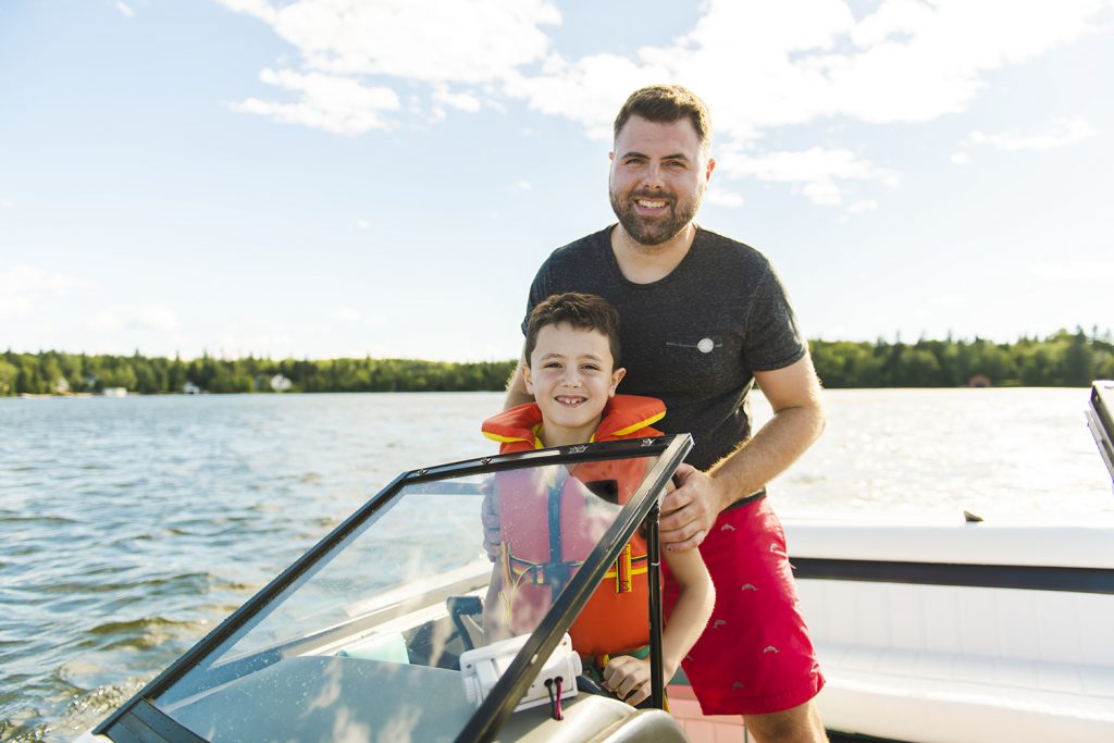 Father boating with son