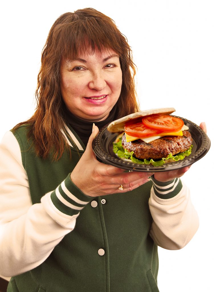 Emily with a hamburger
