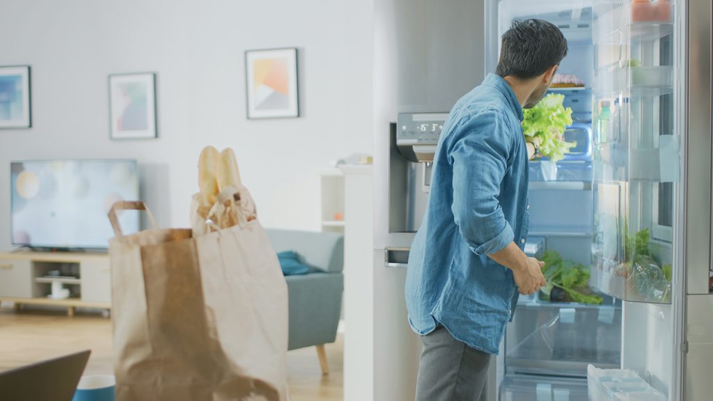 Man in kitchen