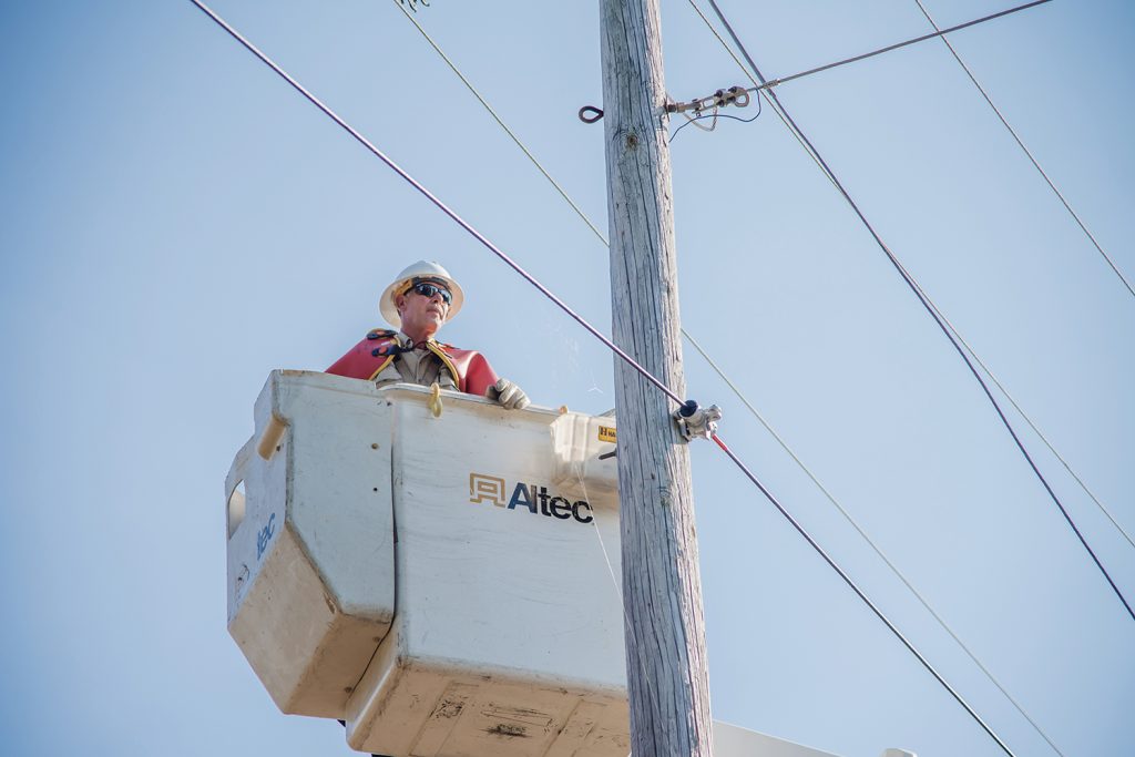 Lineworker in bucket truck