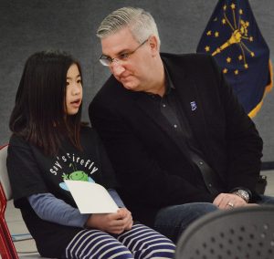 Kayla Xu and Gov. Holcomb