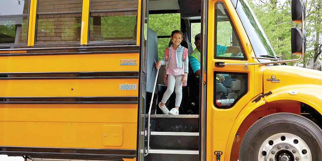 Student on school bus