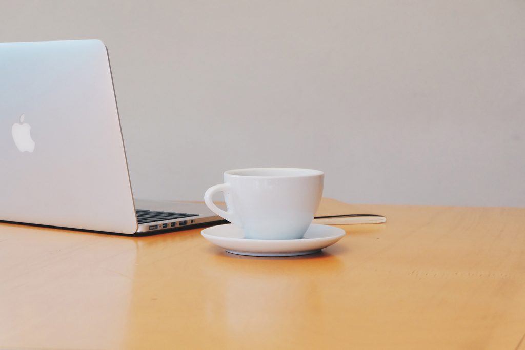 Laptop with coffee