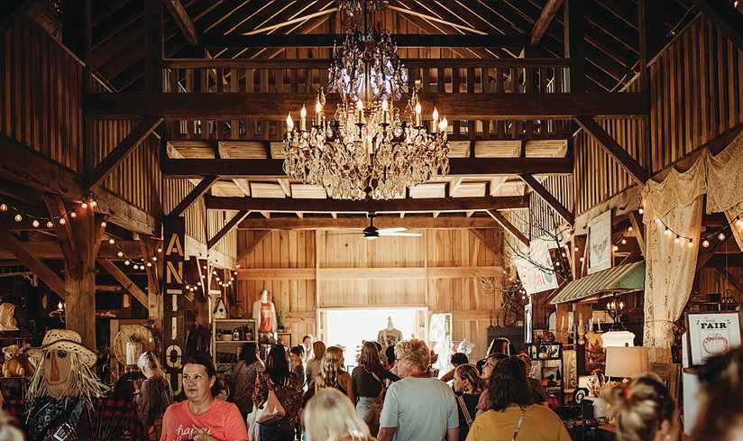 Visitors browse at a fall Chandelier Barn Market event.