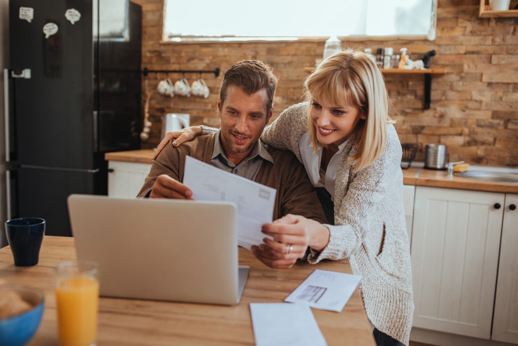 Couple looking at a bill