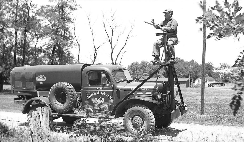 KV REMC employee doing vegetation management in the late 1940s.