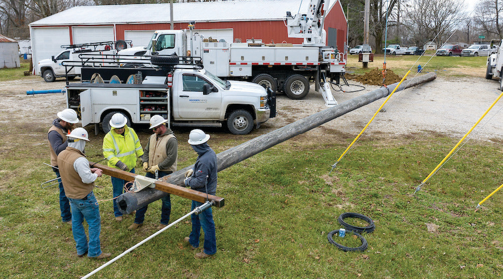 Hoosier Energy crew installs pole