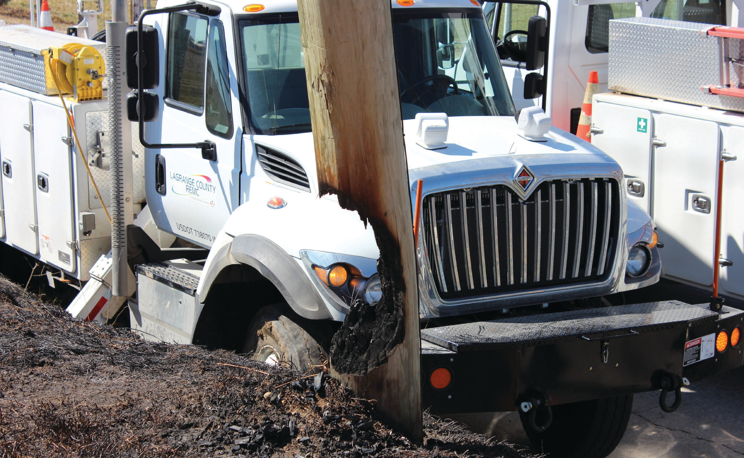 Utility truck into a pole