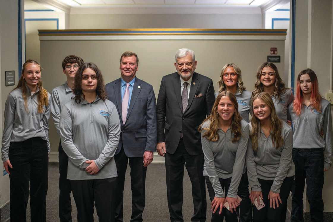 Junior Board members pose with Representative Culp and Soliday at the Indiana Statehouse.