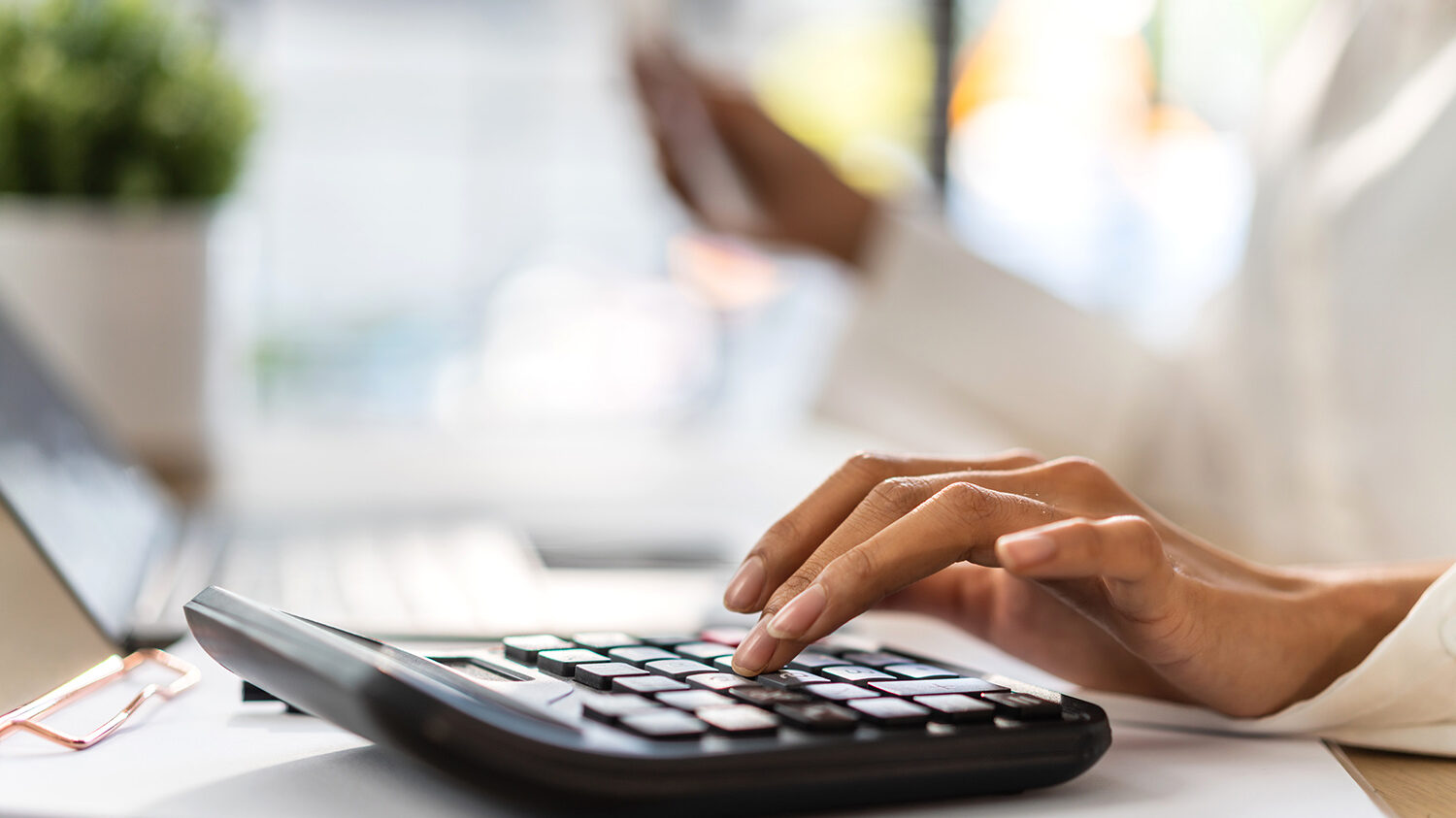 Person with calculator