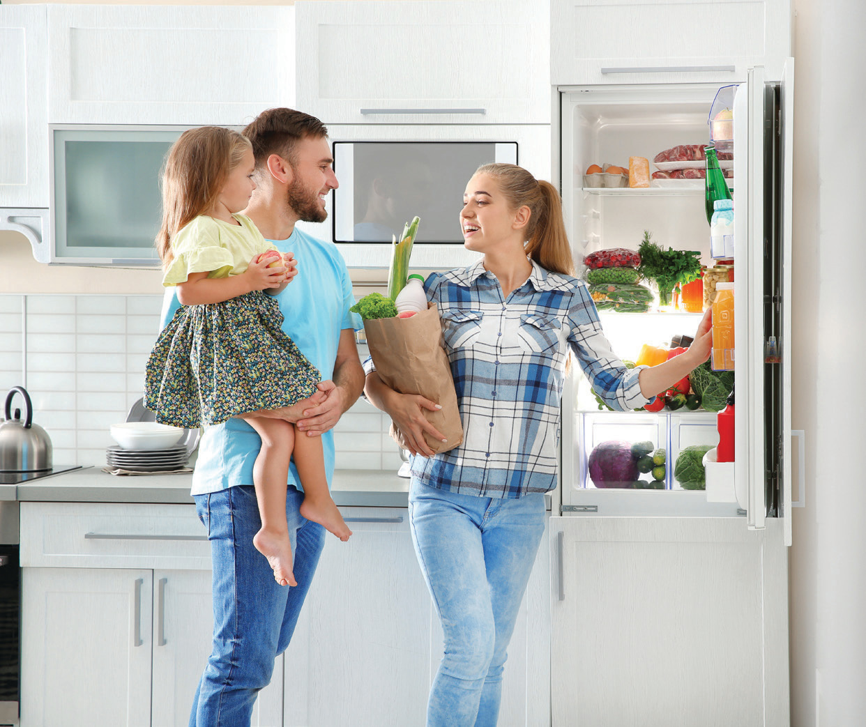 Young couple at fridge