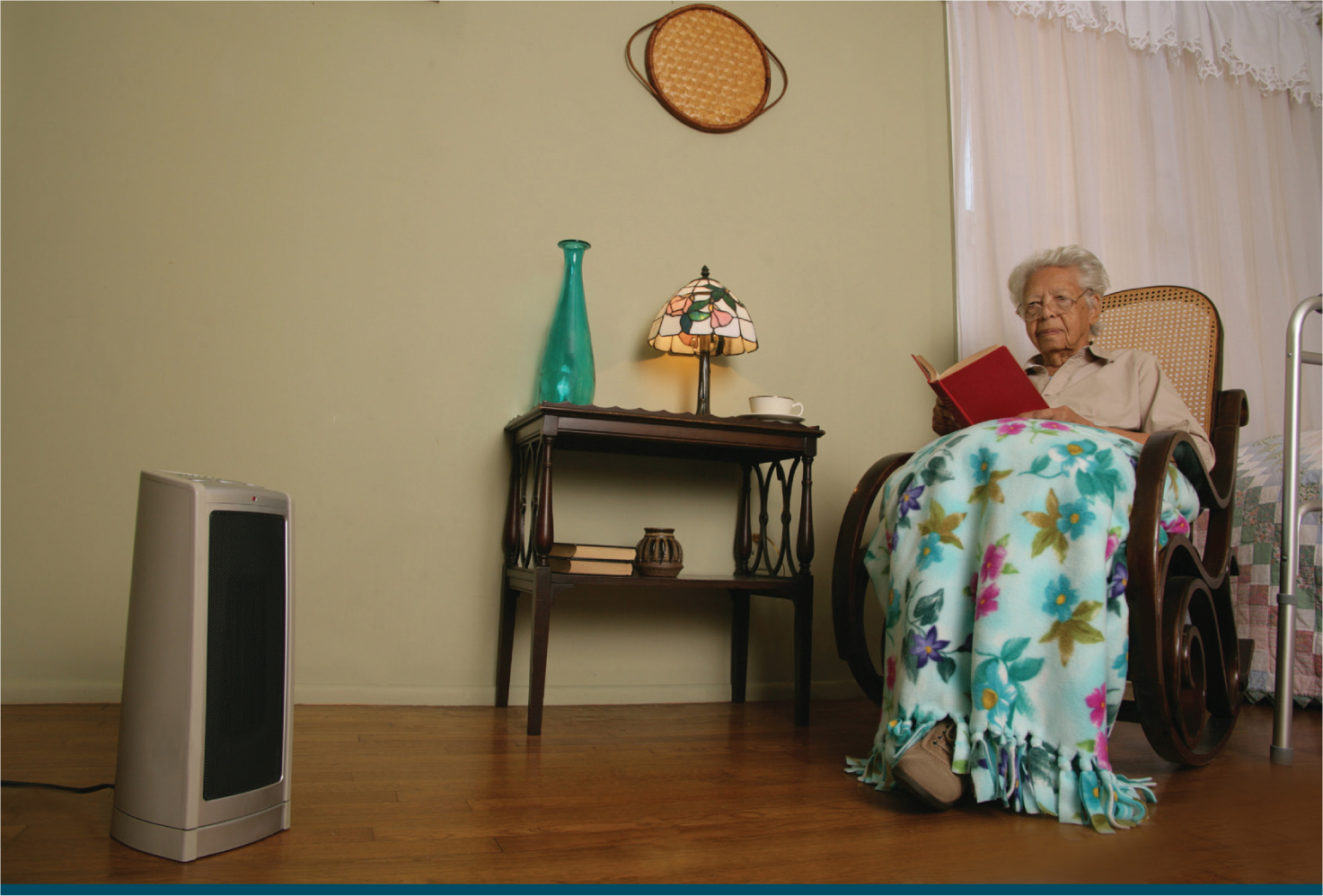 Older lady with space heater