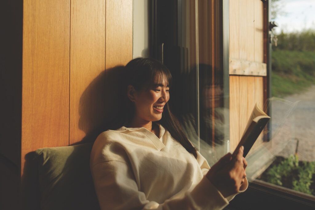 Woman in book nook