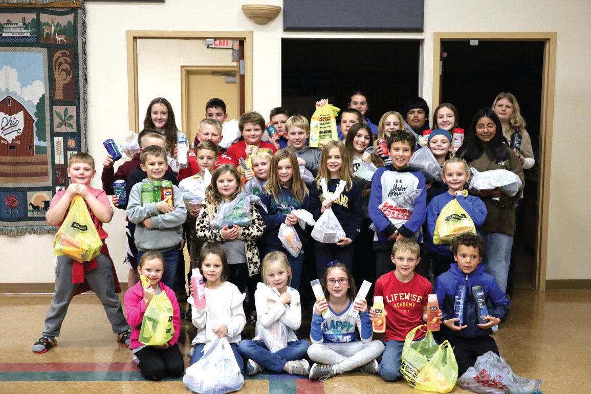 Young students donating items
