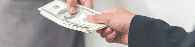 Hands exchaning money