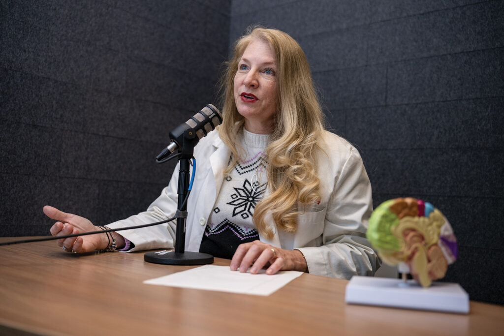 Cindi McGarvey, MD, a neurologist, creates educational content in the Boone Power Recording Studio.

