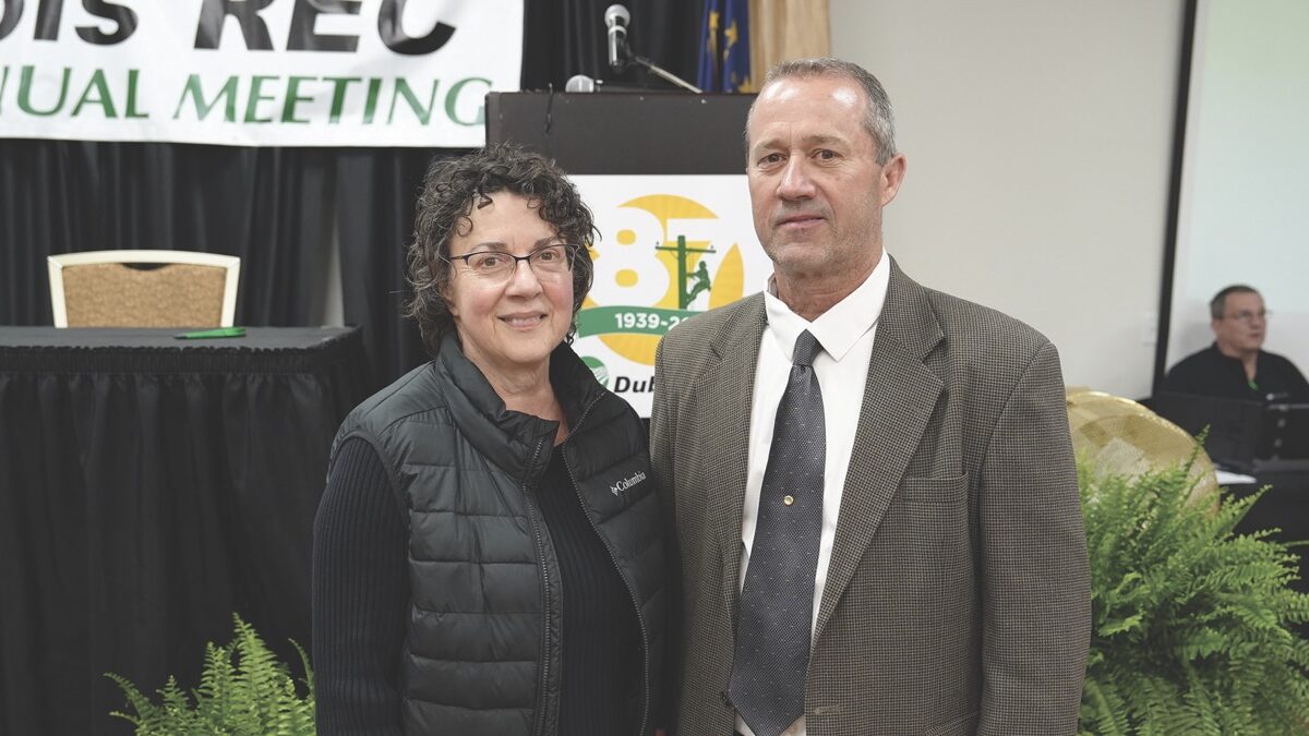 Scott and Brenda Souders were the winners of the Annual Meeting Grand Prize,
a $1,000 gift certificate for electricity. Brenda is pictured here with Dubois
REC’s Greg Dilger.