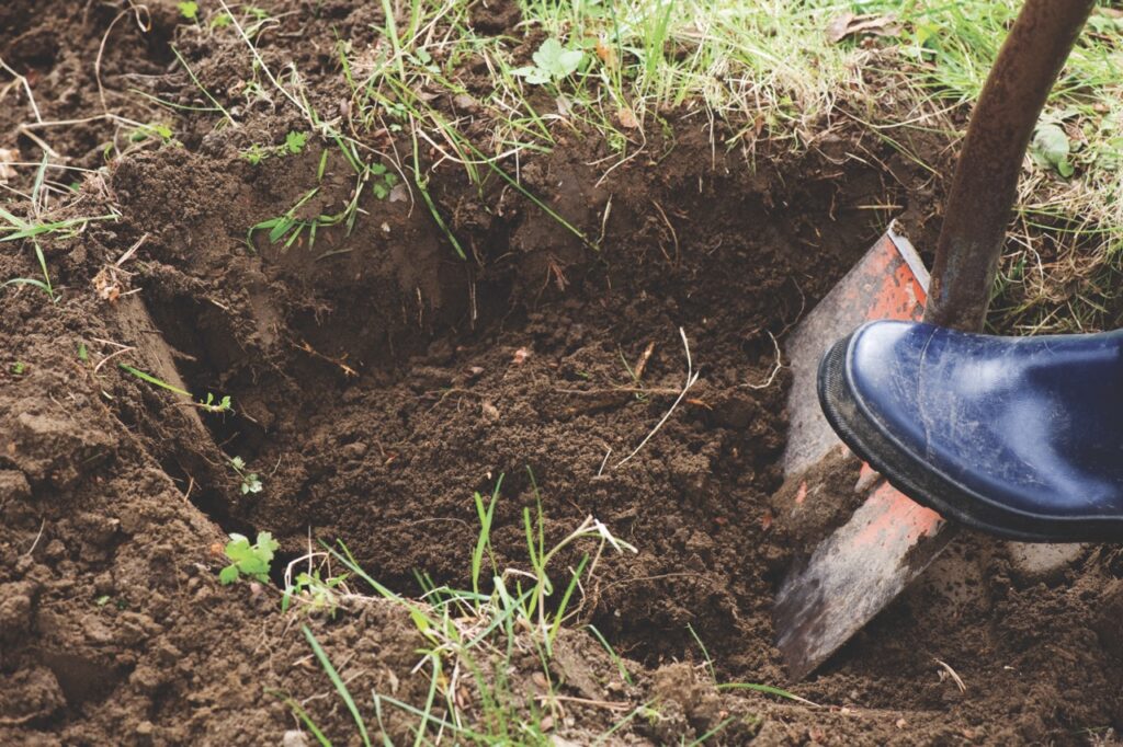 Person digging a hole